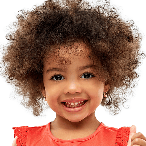 Cheerful child with curly hair and bright smile, full of energy and happiness.