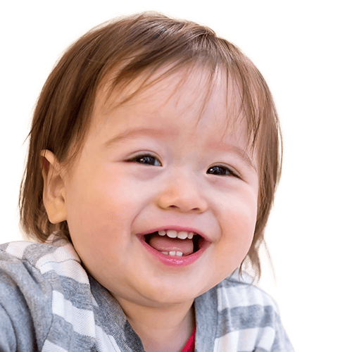 Happy toddler with soft hair and wide smile, expressing warmth and playfulness.